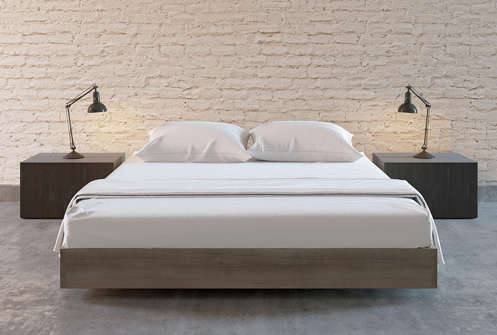 Chambre à coucher minimaliste avec lit et tables de nuit